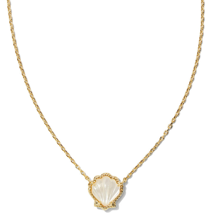 A solid white background with a gold necklace and shell pendant in ivory mother of pearl.