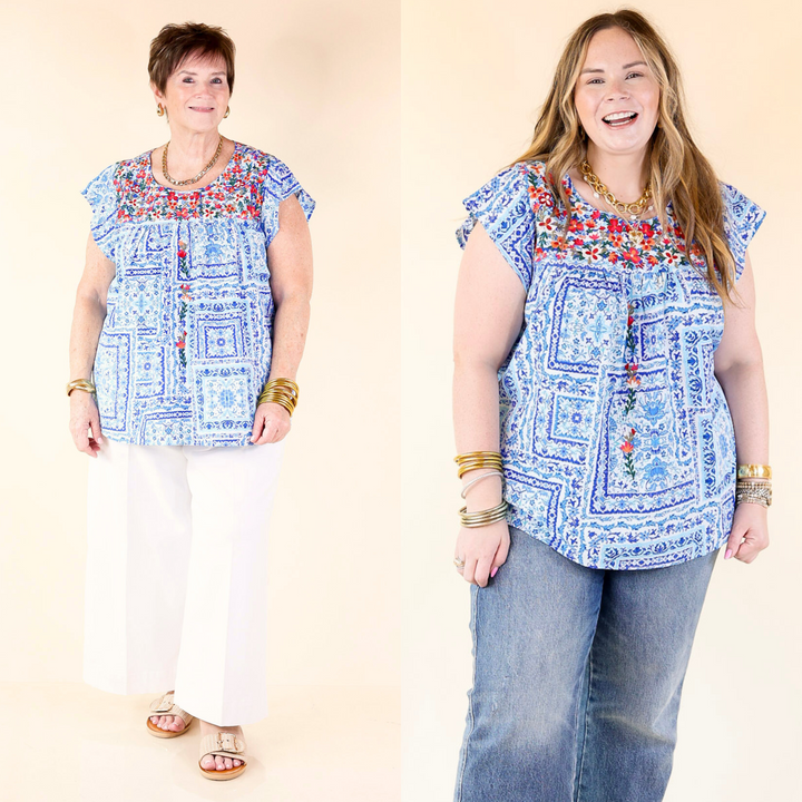 With its cap sleeves and classic round neck, floral embroidery that adds a touch of sophistication. Sizes small through plus sizes.