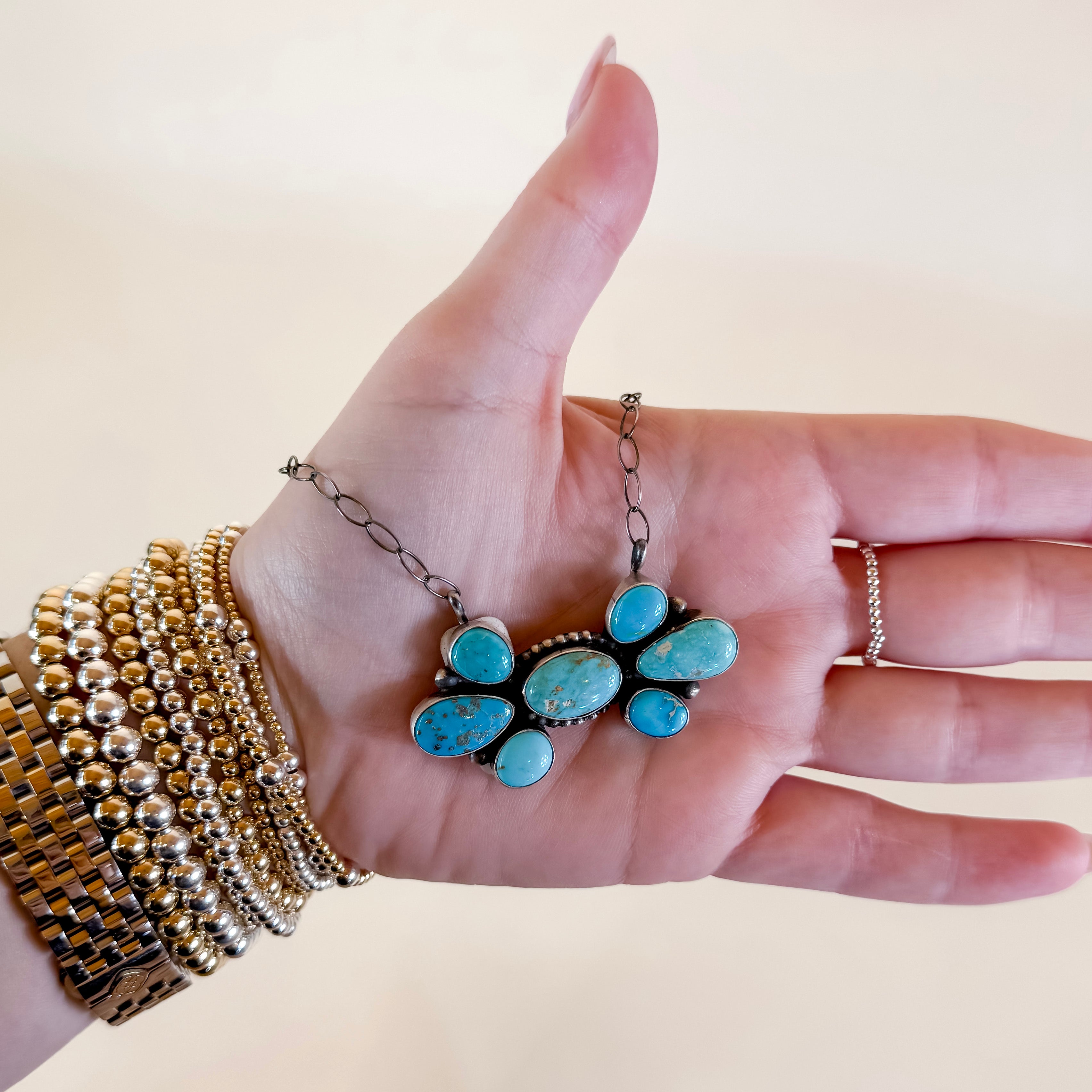 Lorenzo Juan | Navajo Handmade Sterling Silver and Turquoise Stone Cluster Pendant