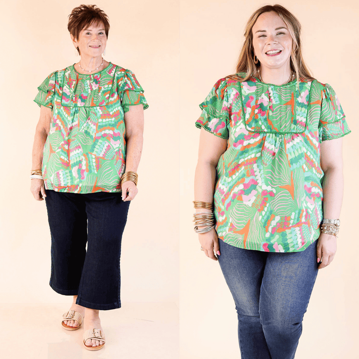 Lovely Dreams blouse features ruffle sleeves, delicate lace accents, and an abstract print that adds an artistic touch. Sizes small through plus sizes. 