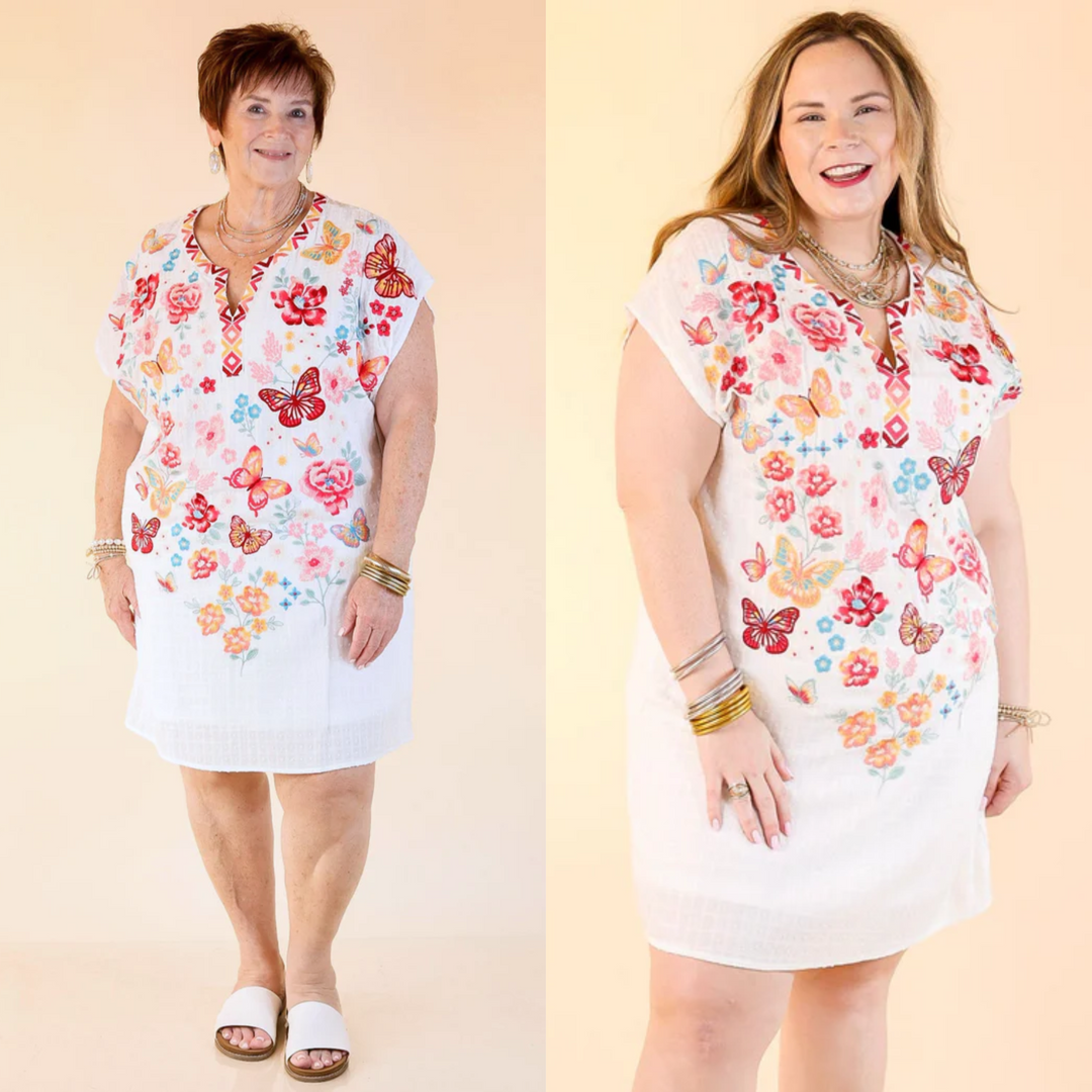 This dress includes cap sleeves, a notched v neckline, and embroidery that consists of butterflies and flowers. Available in sizes small through plus size. 