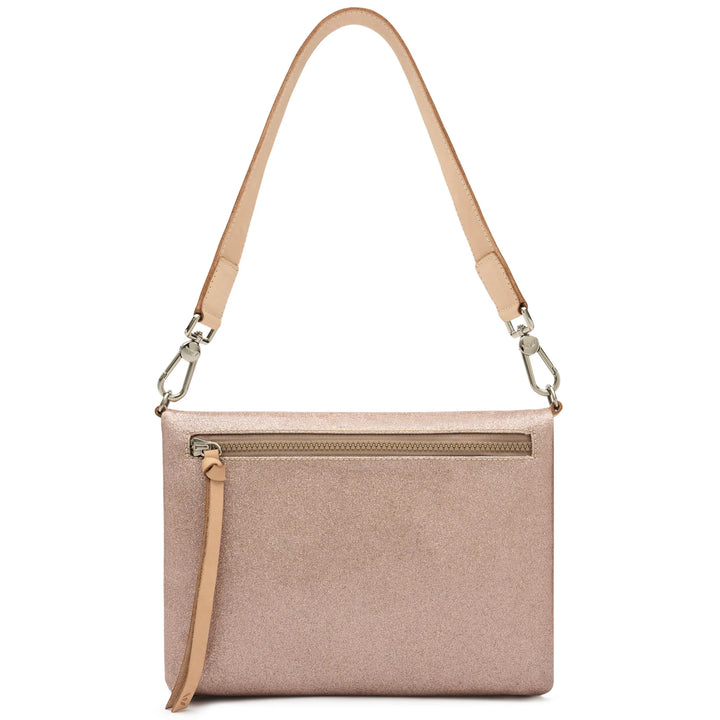 A rectangular shoulder bag in a textured dusty pink fabric with a tan leather strap and silver-tone hardware, shown against a plain white background.
