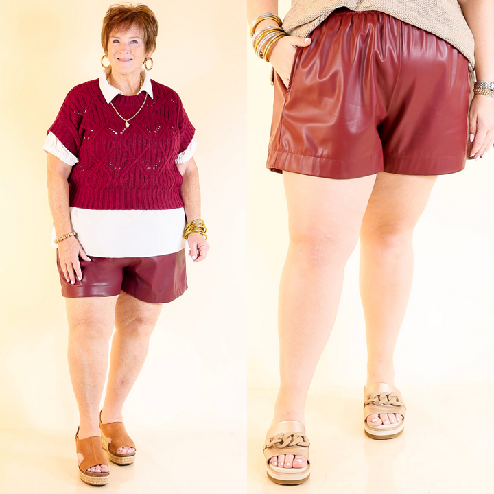 Two people wearing garnet red leather shorts on a beige background