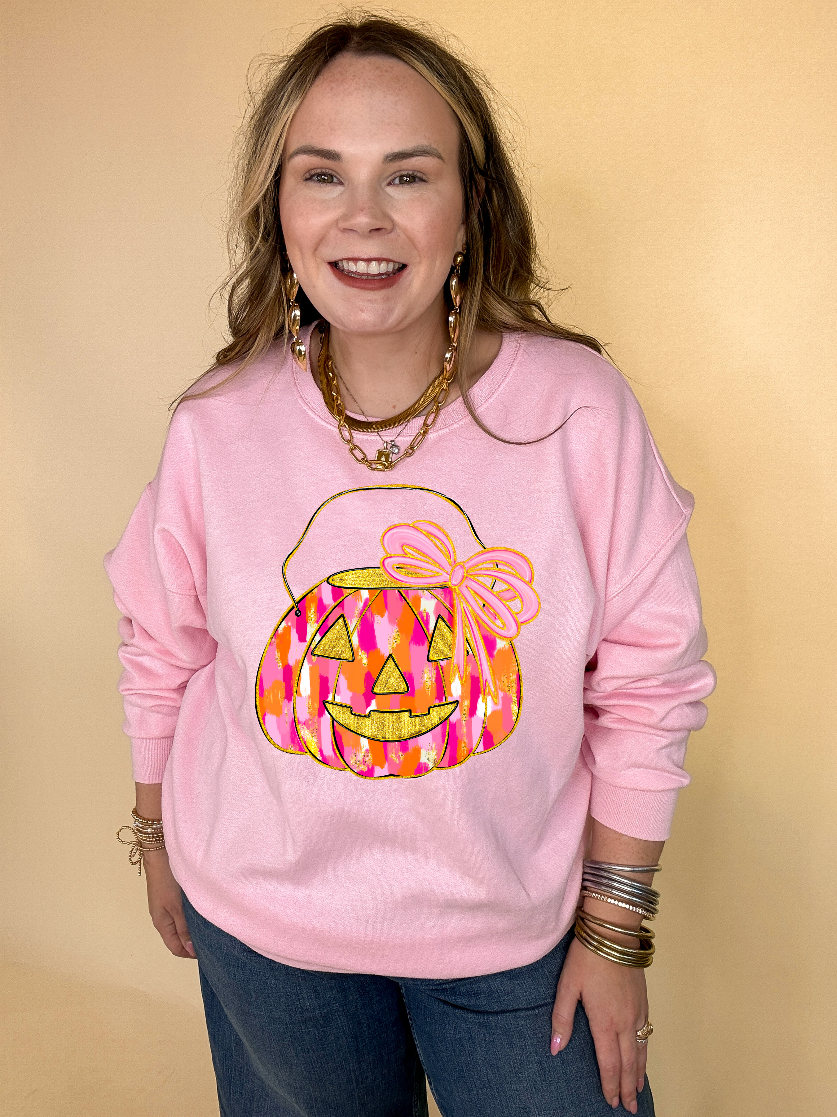 Online Exclusive | Messy Paint Trick-or-Treating Pumpkin with Pink Bow Graphic Sweatshirt in Multiple Color Options