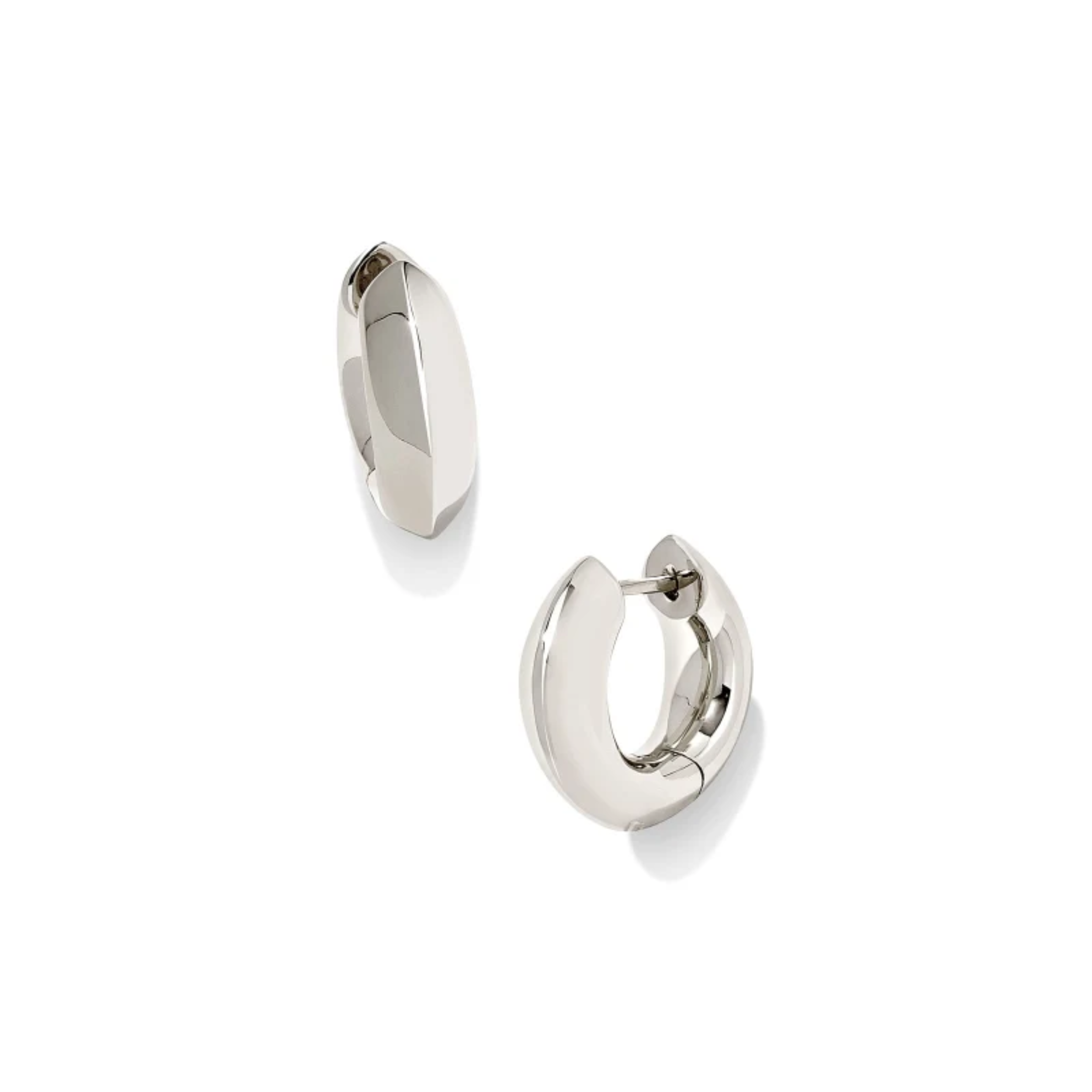 These Mikki Metal Huggie Earrings in Silver by Kendra Scott are pictured on a white background.