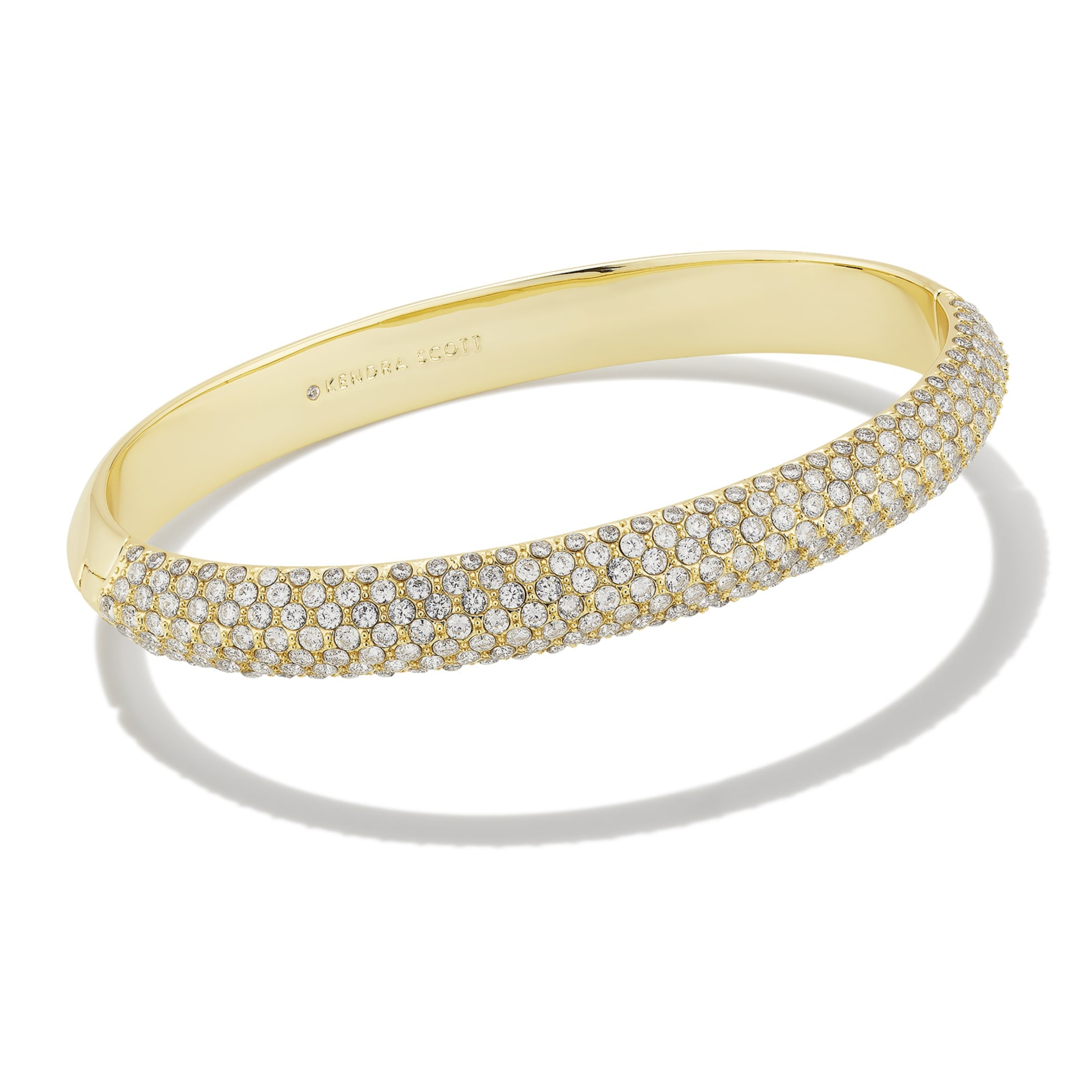 This Mikki Pave Bangle Bracelet In Gold White by Kendra Scott is pictured on a white background.