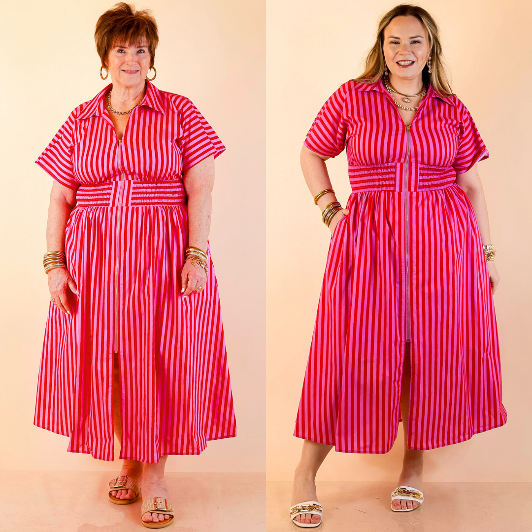 Models are wearing Front Zip Midi Striped Print Dress with Smocked Waist and Short Sleeves in Pink and Red against a beige backdrop. 