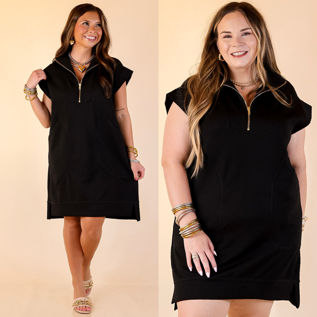 Two women wearing black cap sleeve dresses on a beige background