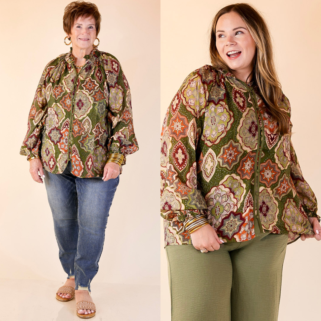 Two women wearing boho mosaic tops in olive green and jeans on a beige background.
