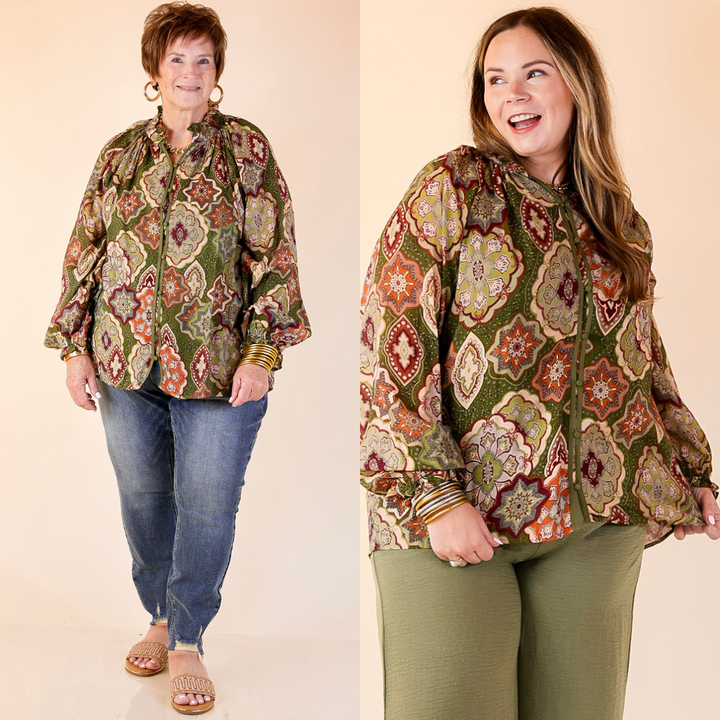 Two women wearing boho mosaic tops in olive green and jeans on a beige background.