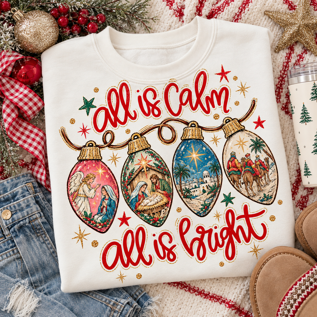 Nativity Lights Christmas graphic tee or sweatshirt on white with All is Calm All is Bright script with nativity scene light bulbs