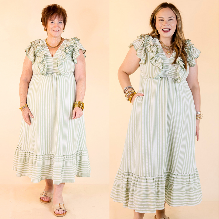 This dress features a striped print, V-neckline, and ruffle cap sleeves. Sizes small through large.
