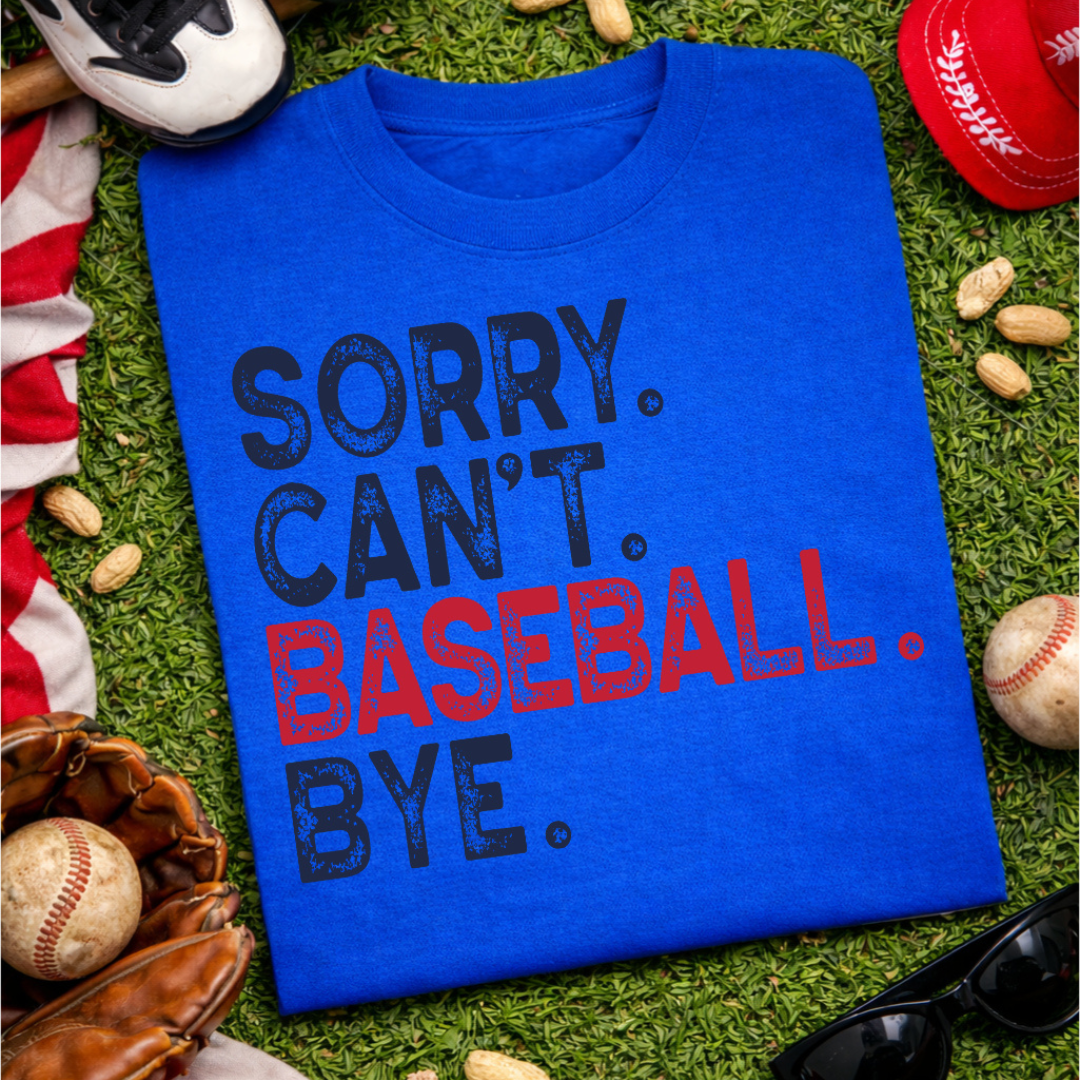 Royal blue graphic tee featuring the phrase "Sorry. Can&