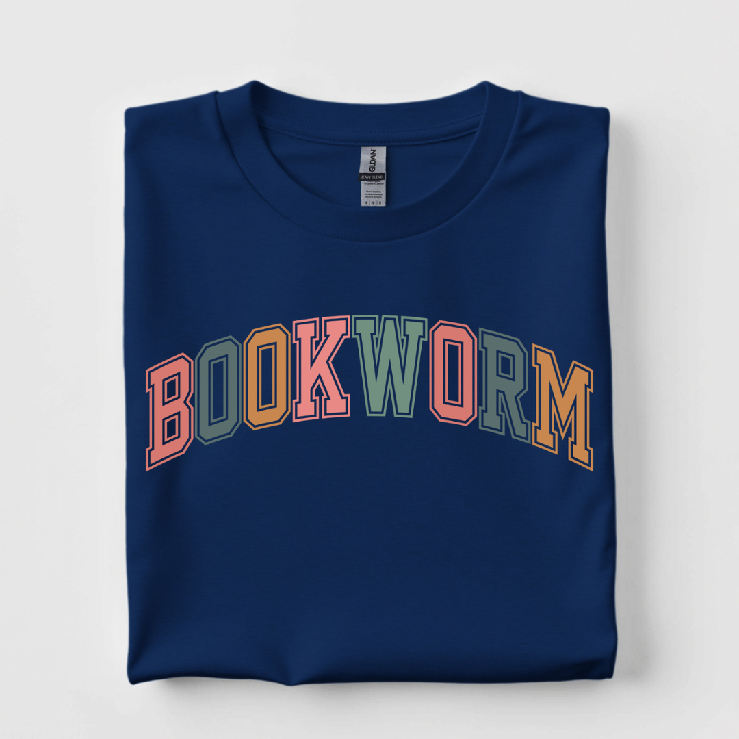 Navy blue graphic tee featuring colorful varsity-style Bookworm lettering across the front.
