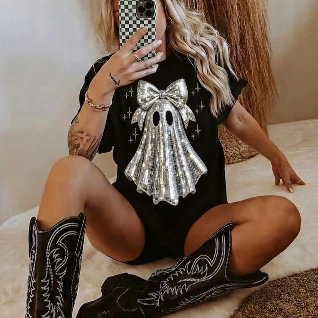 Black graphic tee featuring a disco-inspired ghost with a large faux sequin bow and shimmering mirrorball print.