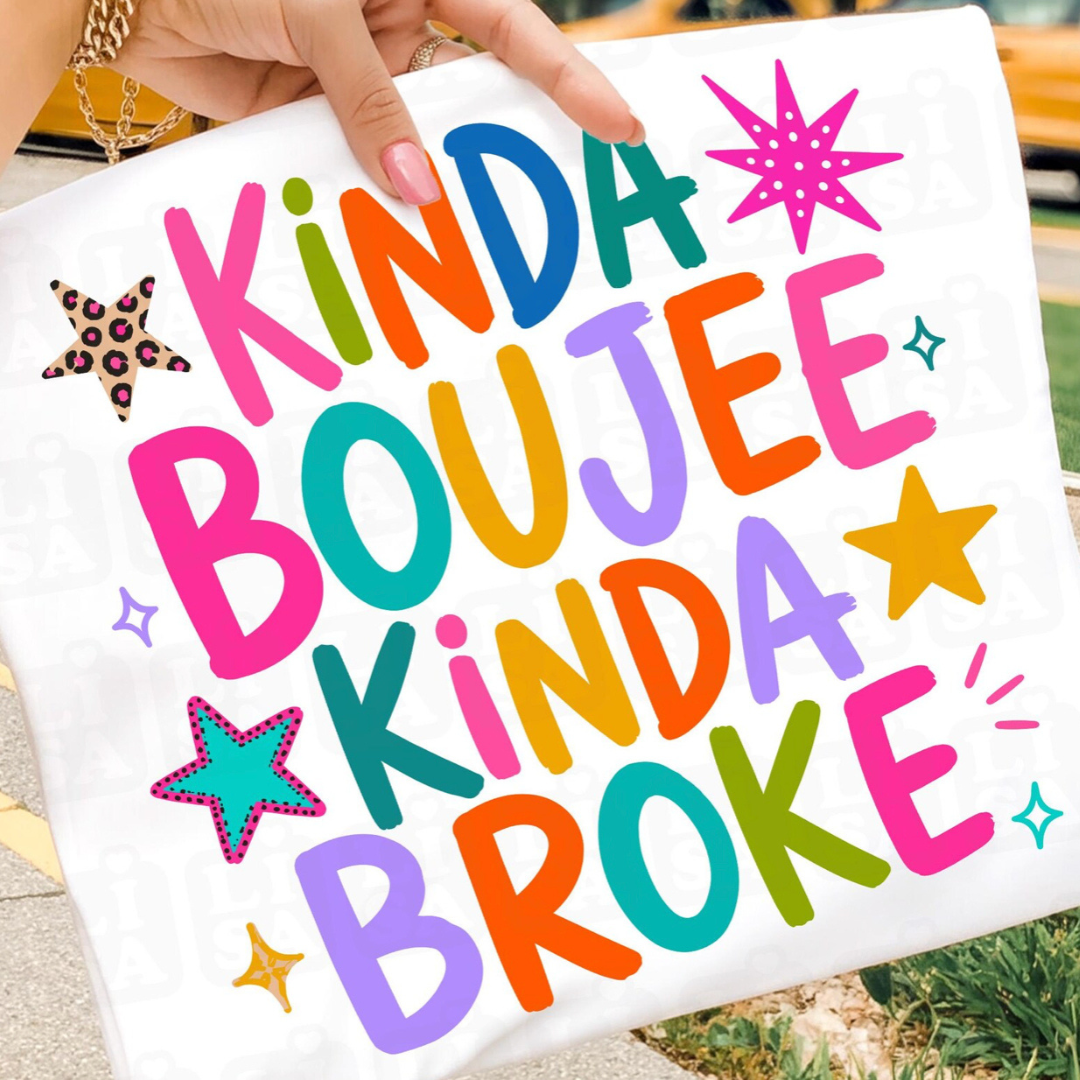White graphic tee featuring colorful lettering that reads "Kinda Boujee Kinda Broke" with bright star accents.