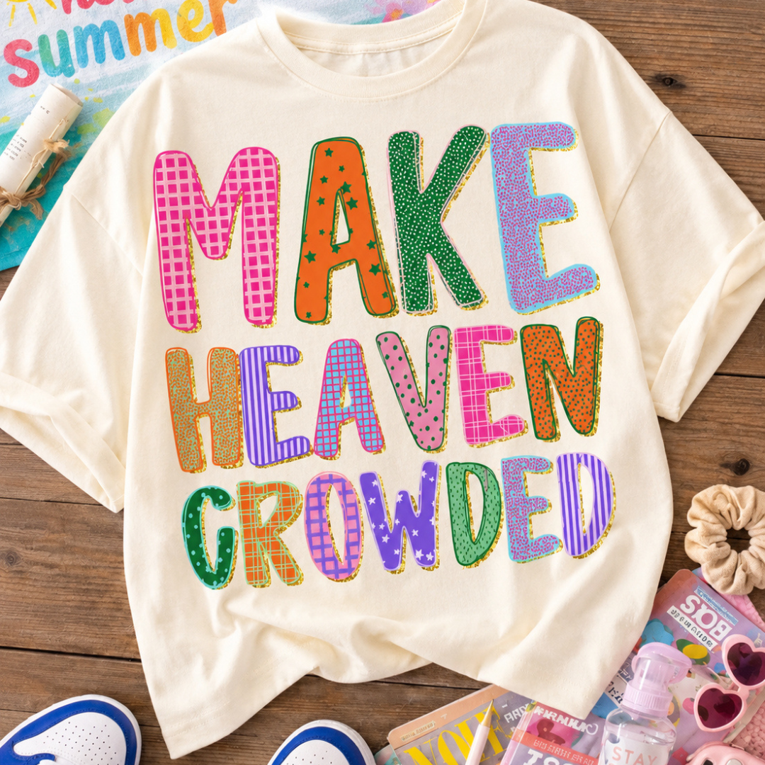 Natural cream graphic tee featuring colorful patterned lettering that reads "Make Heaven Crowded."
