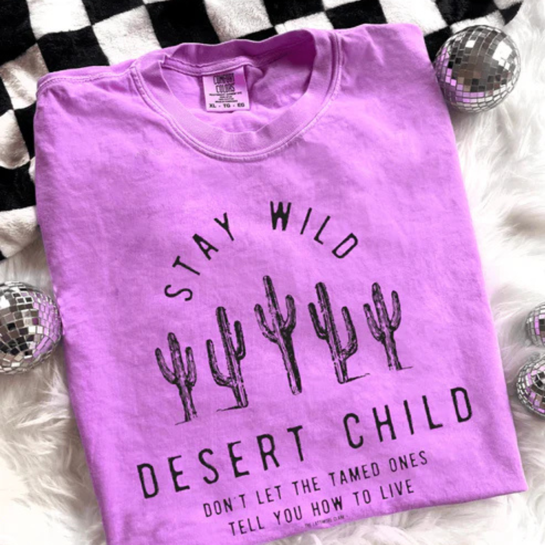 Stay Wild Desert Child Comfort Colors t-shirt in neon violet featuring a vintage cactus graphic and Western-inspired design for everyday casual style.