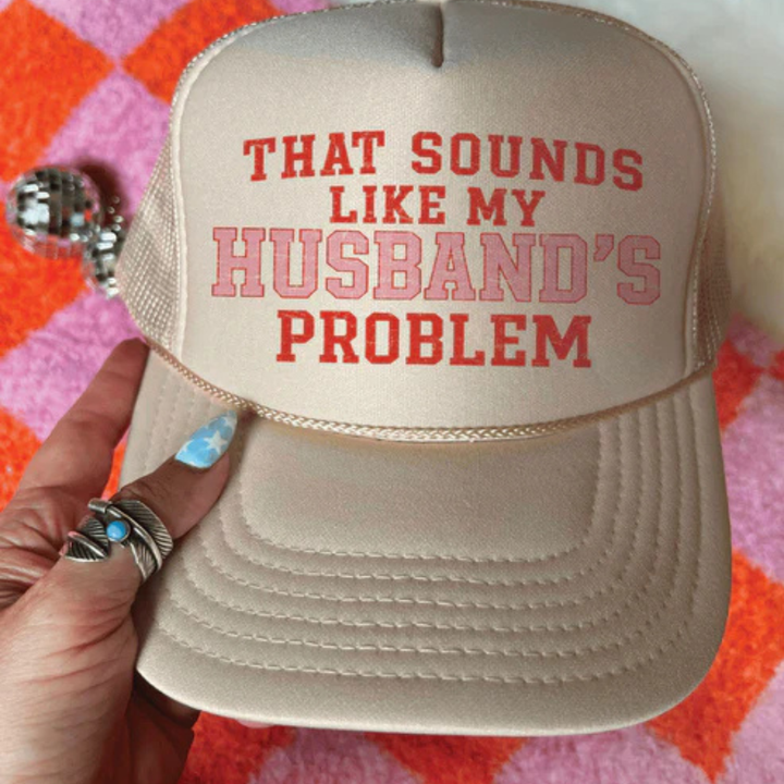 Foam trucker hat available in multiple colors featuring the phrase That Sounds Like My Husband&