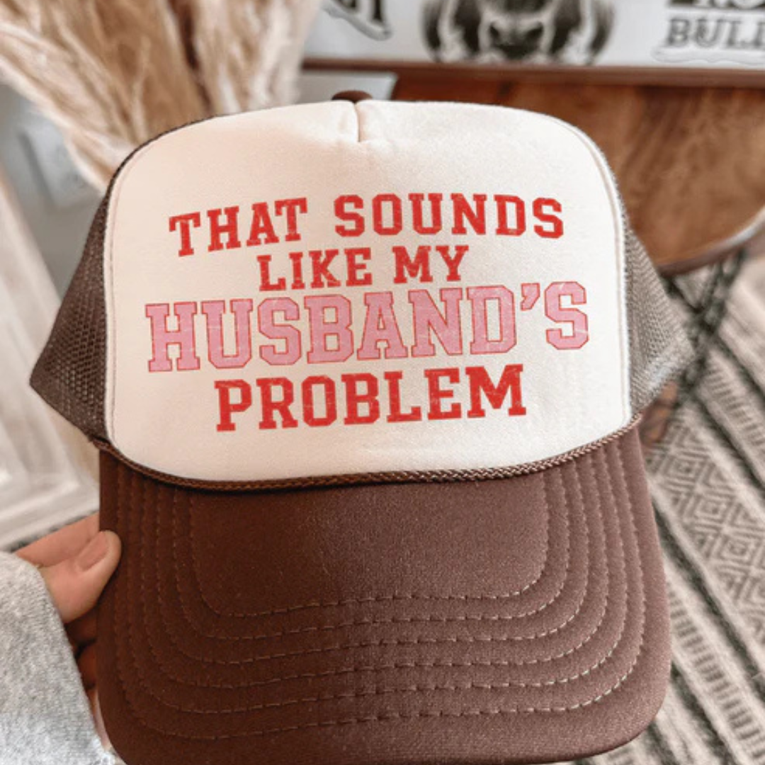Foam trucker hat available in multiple colors featuring the phrase That Sounds Like My Husband&