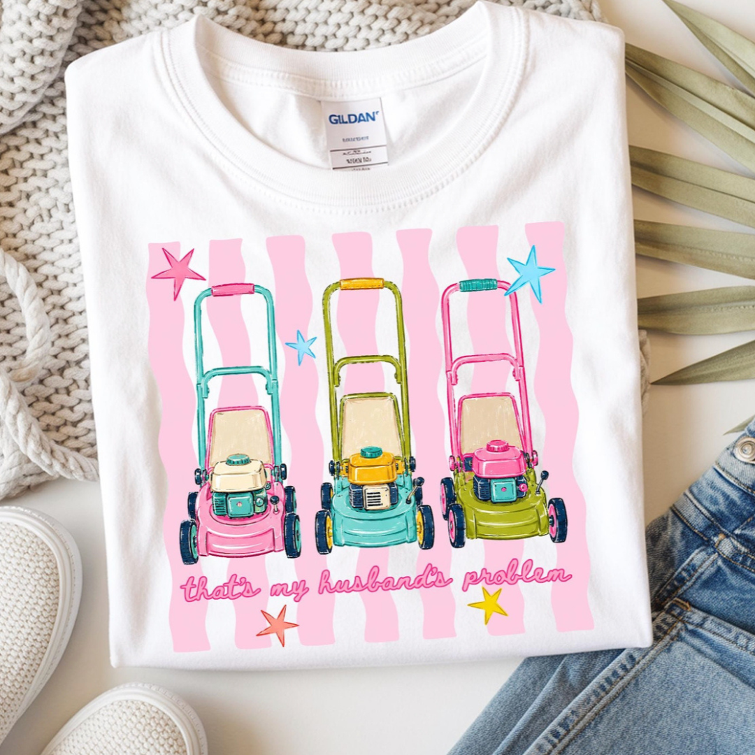 White graphic tee featuring colorful lawn mowers and the phrase "That&