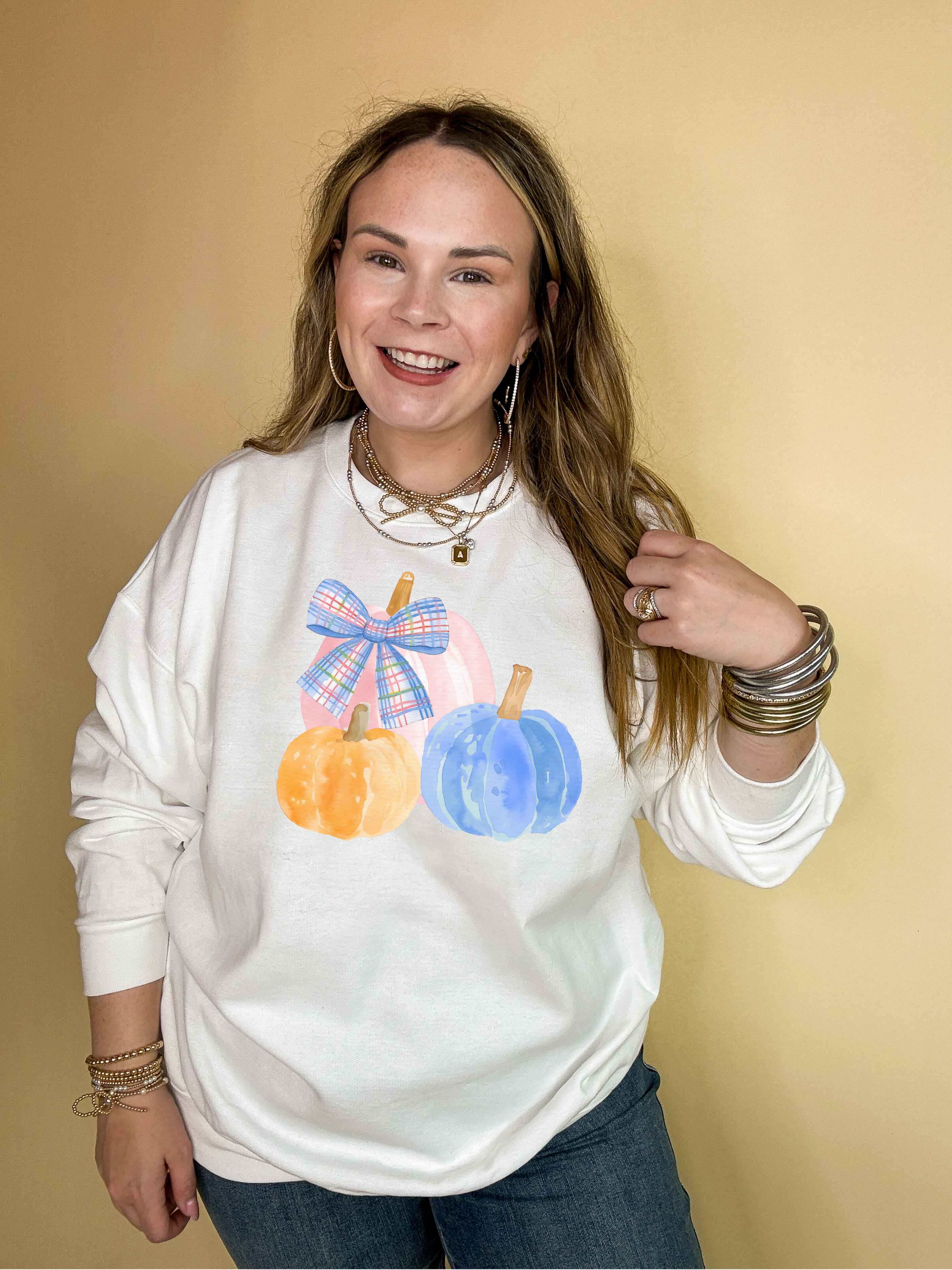 Online Exclusive | Pastel Patch Pumpkins in Orange, Pink and Blue with Plaid Bow Graphic Sweatshirt in Multiple Color Options