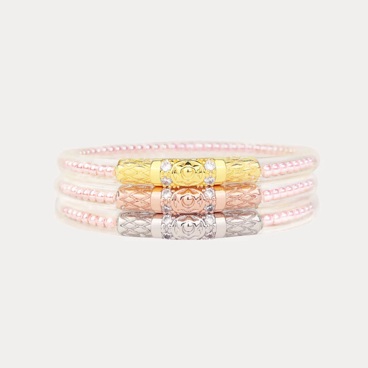 BuDhaGirl Pink Pearl Three Queens All Weather Bangles Set of 3 with gold, rose gold, and silver signature clasp details.
