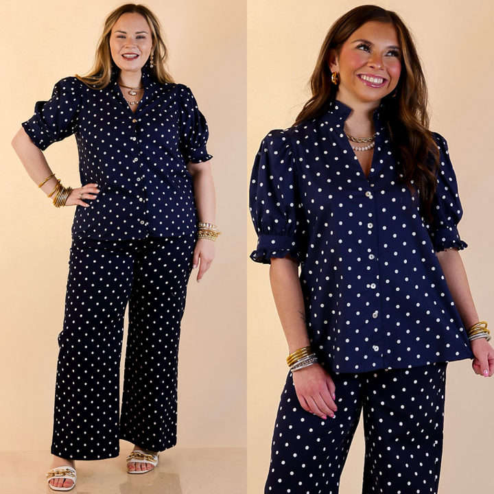 Models are wearing Button Front Puff Sleeve Top with Polka Dot Print in Navy Blue and White with matching Jeans. 