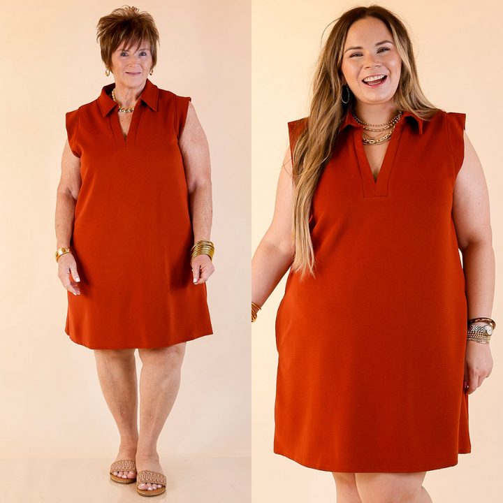 Two women wearing rust cap sleeve with collar dress against a beige background