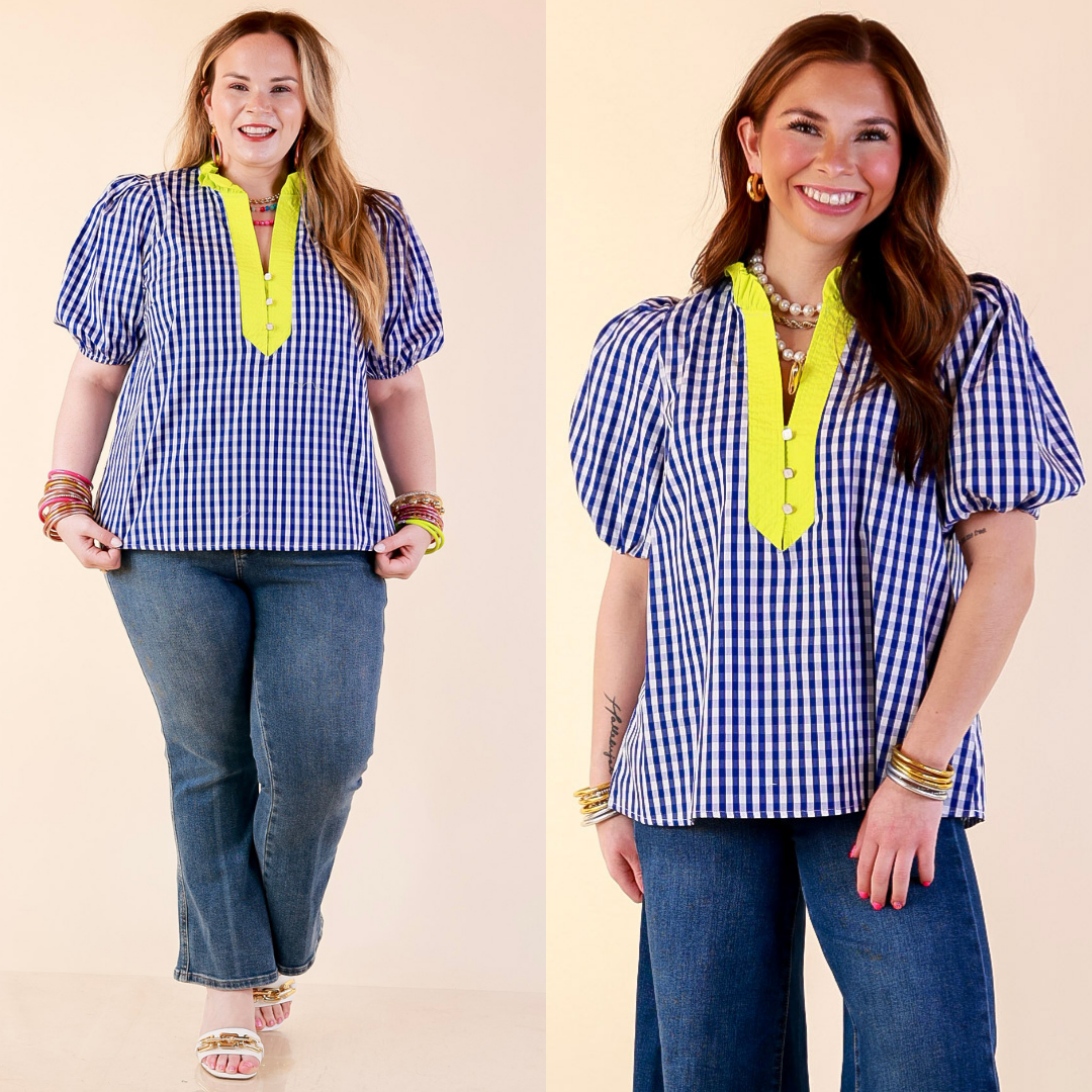 Models are wearing Short Puff Sleeve Gingham Top with Contrast Lime Green Trim in Royal Blue and White with Jeans against a beige backdrop. 