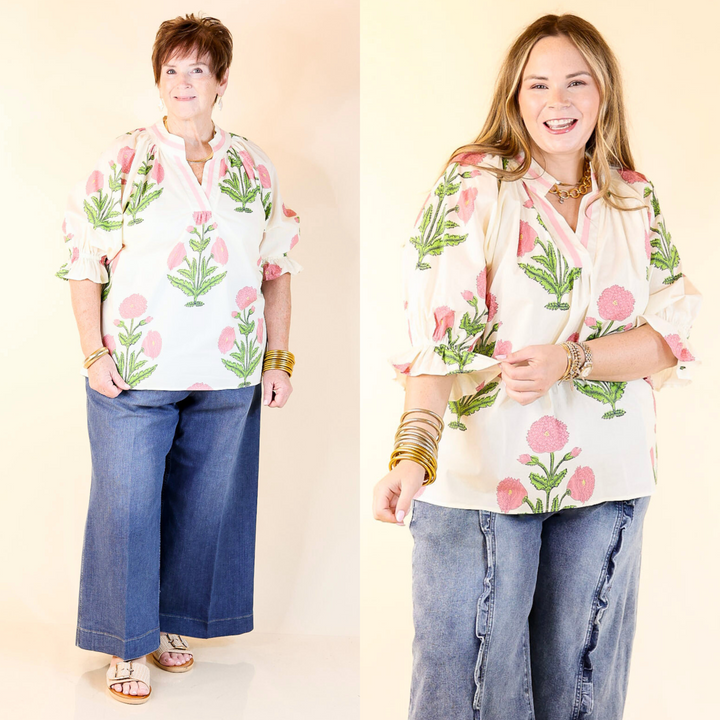 Featuring a flowers and playful ruffle sleeves, this v-neck collared blouse is finished with a subtle stripe in the collar for a touch of charm. Sizes XL to 2X.