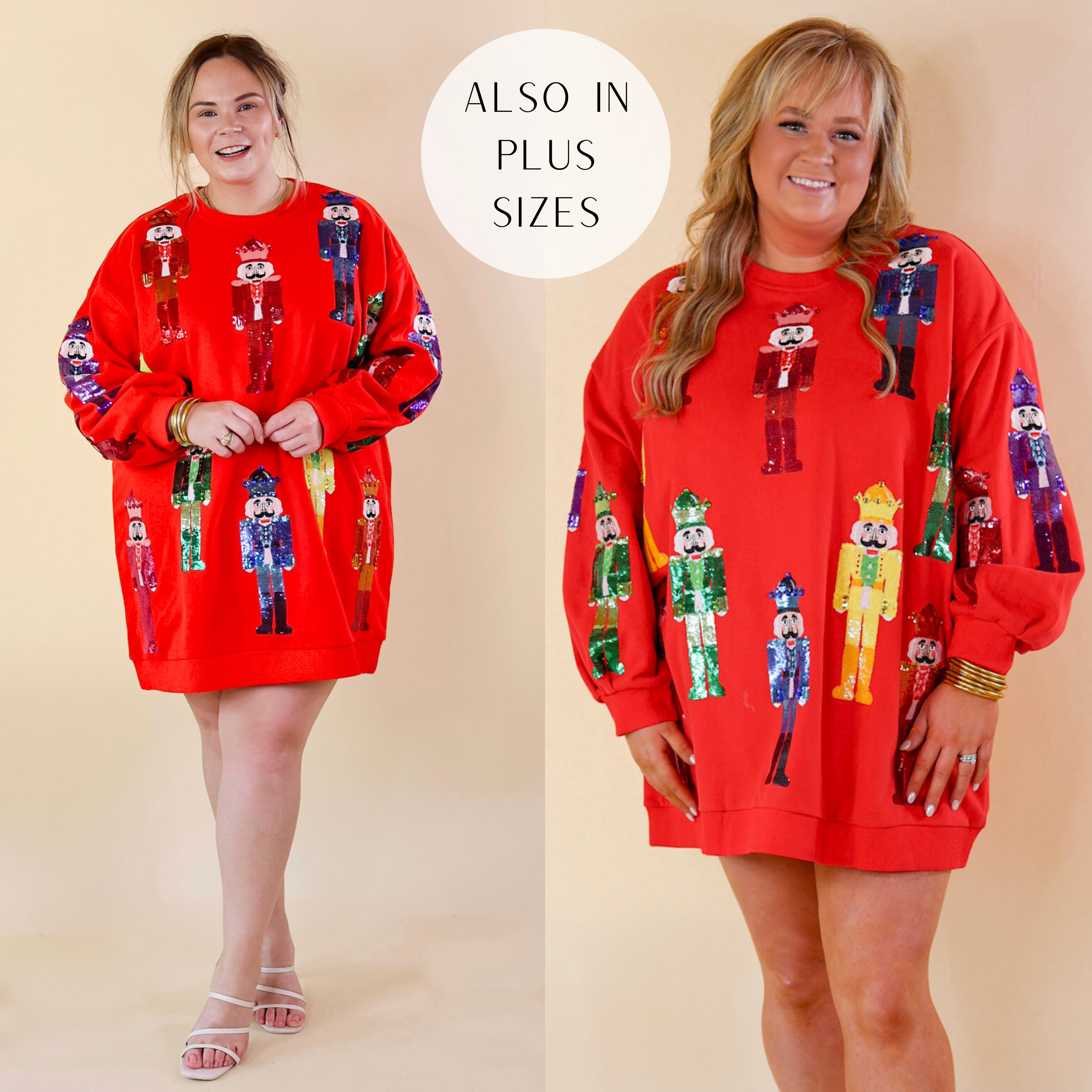 Model is wearing a red sweatshirt dress with sequin multi color nutcrackers. Model has it paired with white booties and gold jewelry.