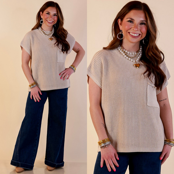 Model is wearing Cap Sleeve Sweater with Front Pocket in Natural Beige with Jeans against a beige backdrop. 