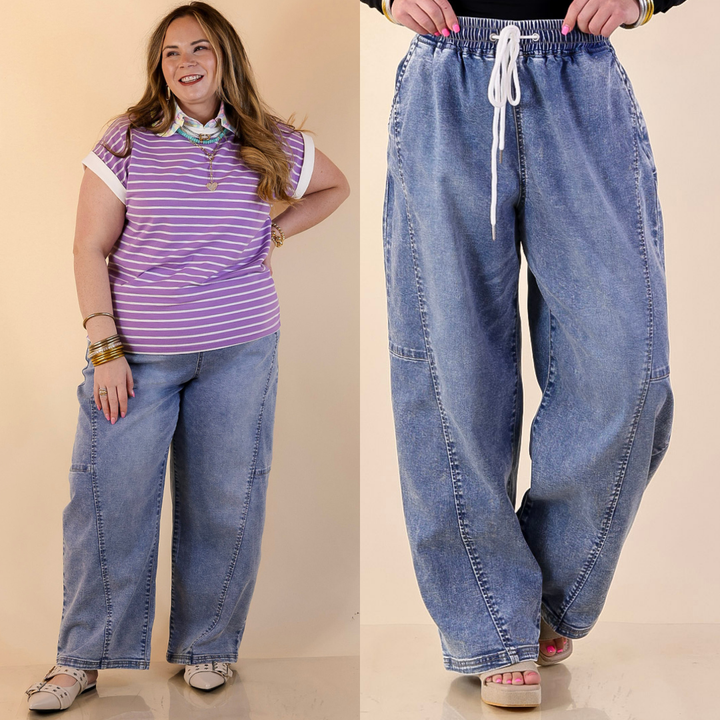 Woman wearing a purple striped shirt and Elastic Drawstring Waistband Featherweight Barrel Jean in Light Wash.