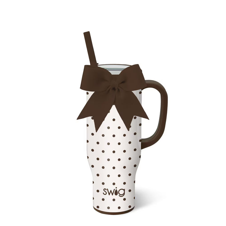 Insulated 30 ounce mega mug in a cream and brown polka dot print with a brown bow, handle and straw.