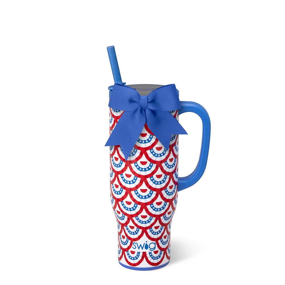 Swig Liberty Belle 30 oz Mega Mug featuring a patriotic red, white, and blue bunting print with a blue handle, reusable straw, and decorative blue bow.