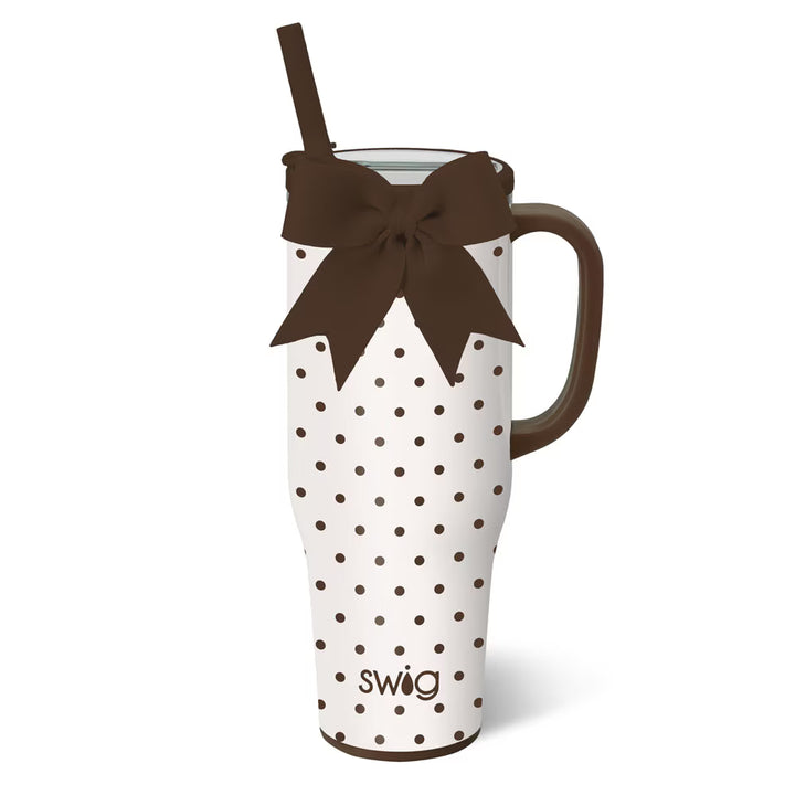 Insulated 40 ounce mega mug in a cream and brown polka dot print with a brown bow, handle and straw.