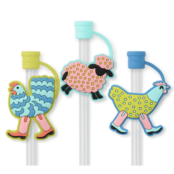3 reusable straws with 3 silicone toppers. A colored cap that covers the straw opening. Each topper has a icon on it (left to right) blue chicken with boots, pink sheep with yellow polka dots, green chicken with boots.