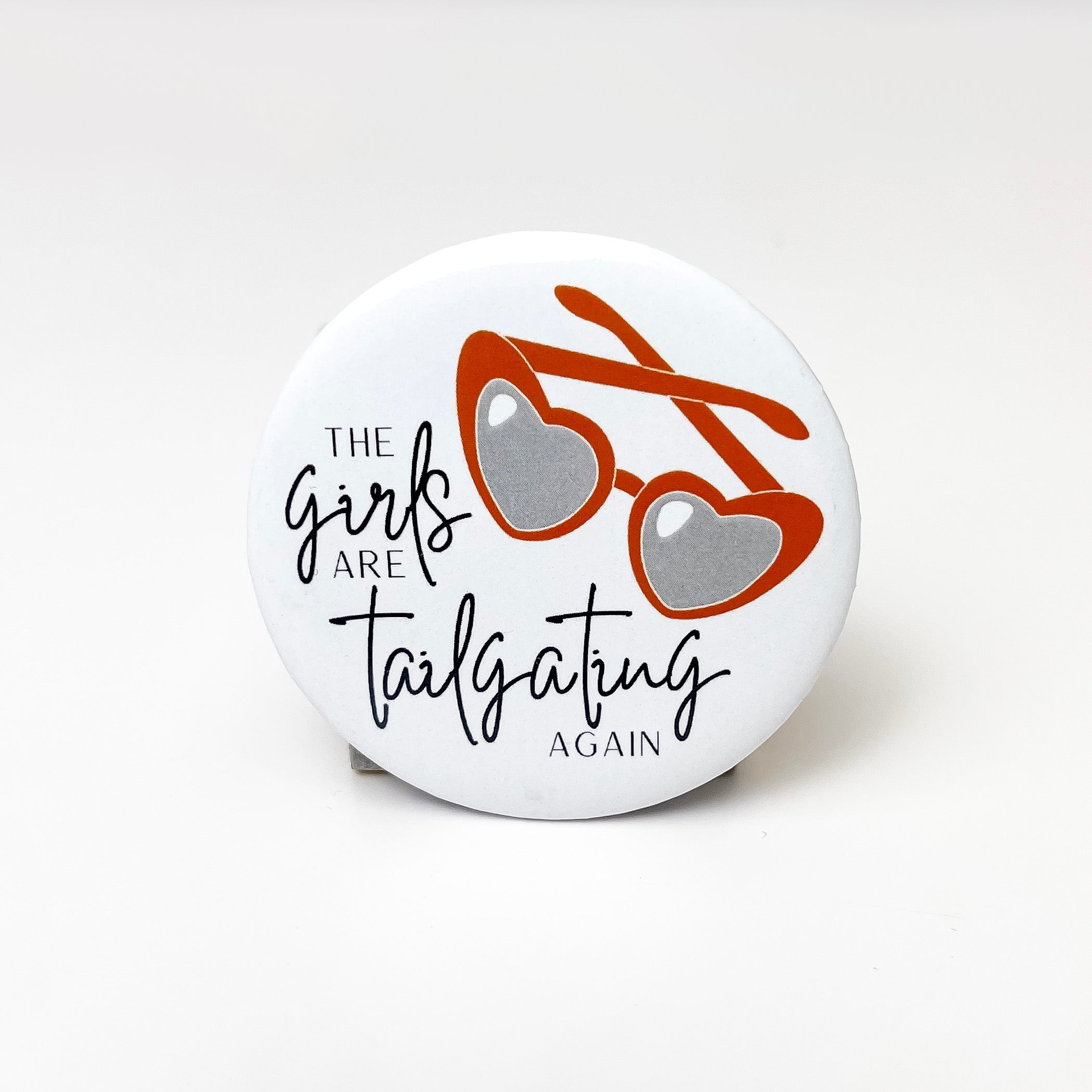 The Girls Are Tailgating Again Gameday Button Pin in Orange and White