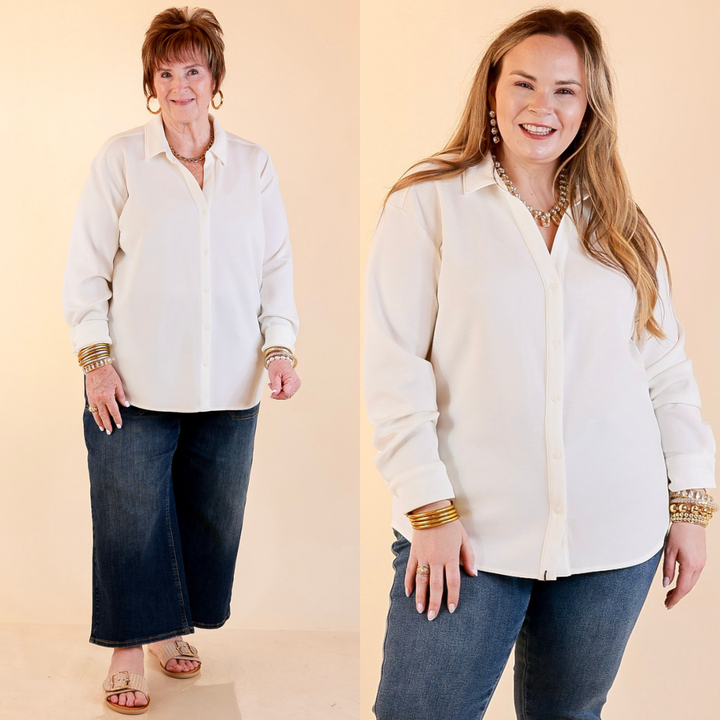 Models are wearing SPANX AirEssentials Button Down Top in White with Jeans against a beige backdrop. 