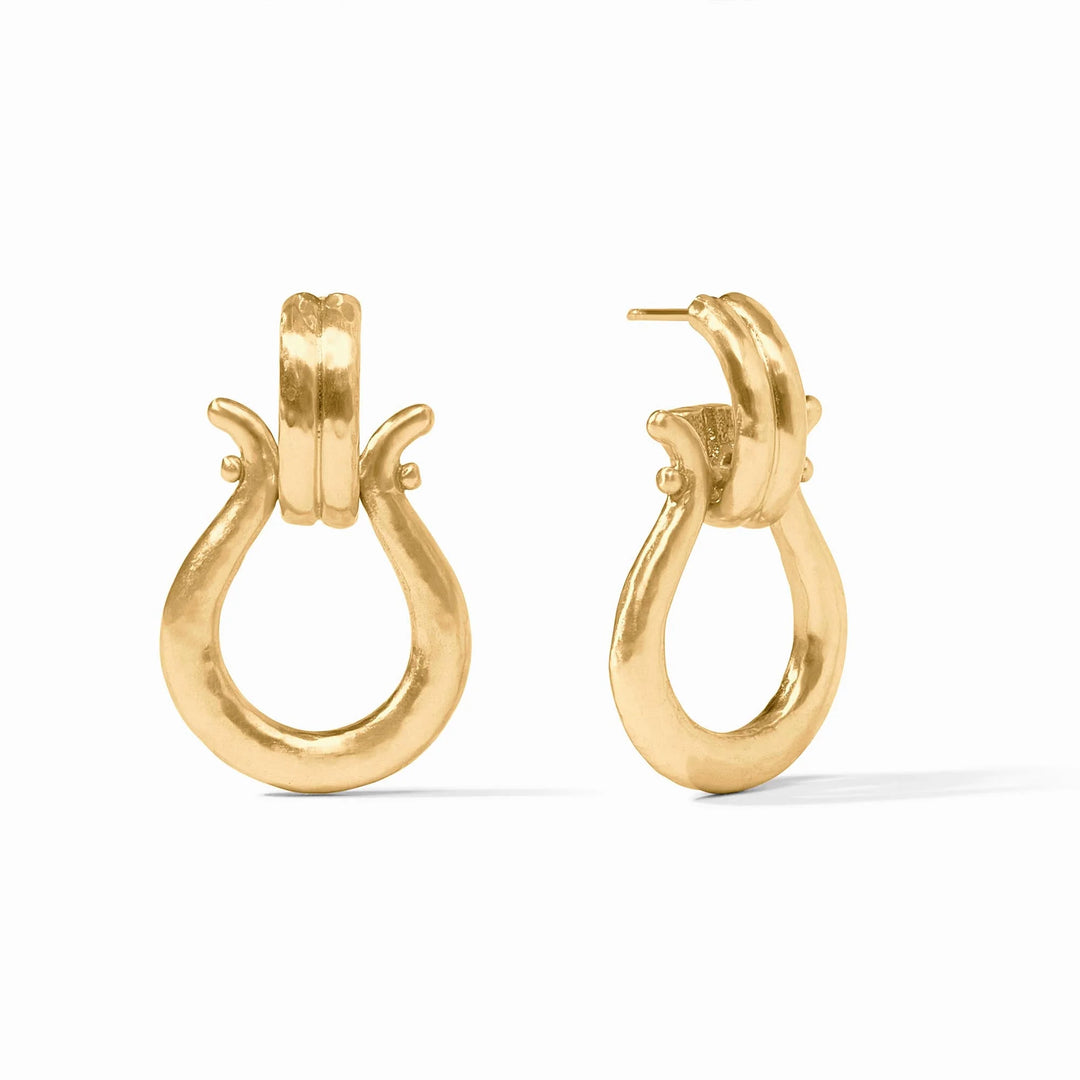 Gold hoop earrings on a white background