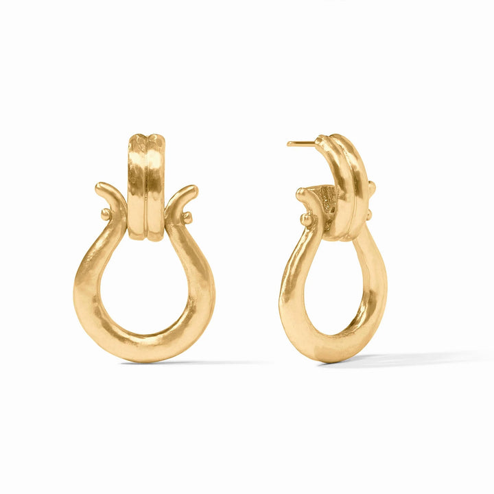 Gold hoop earrings on a white background