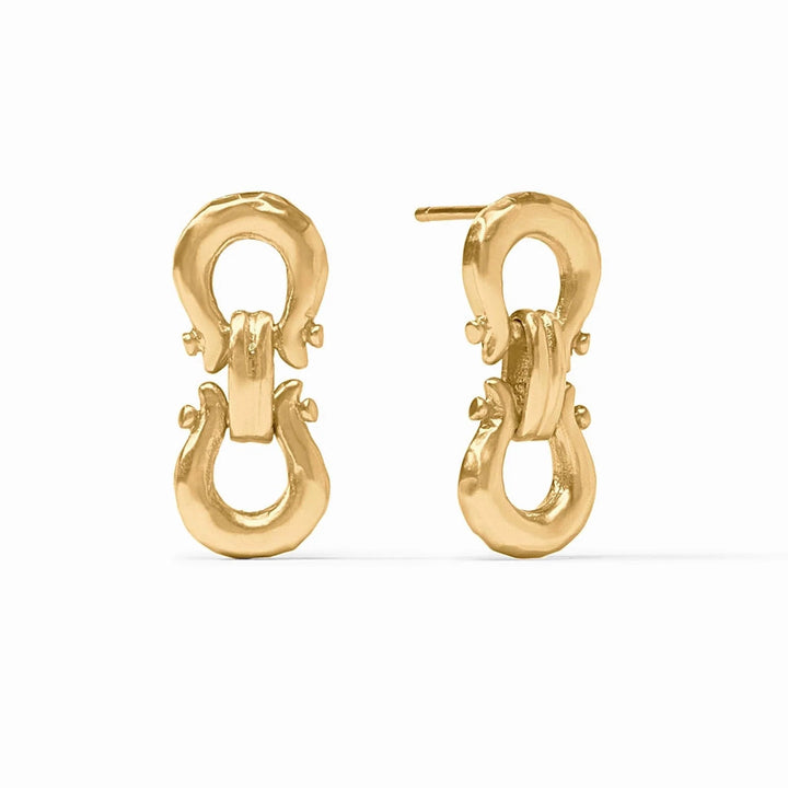Gold earrings on a white background