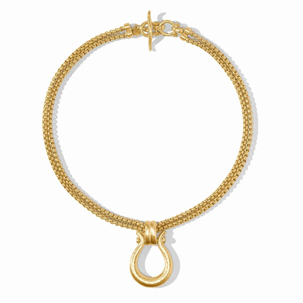 Gold necklace with a clasp on a white background