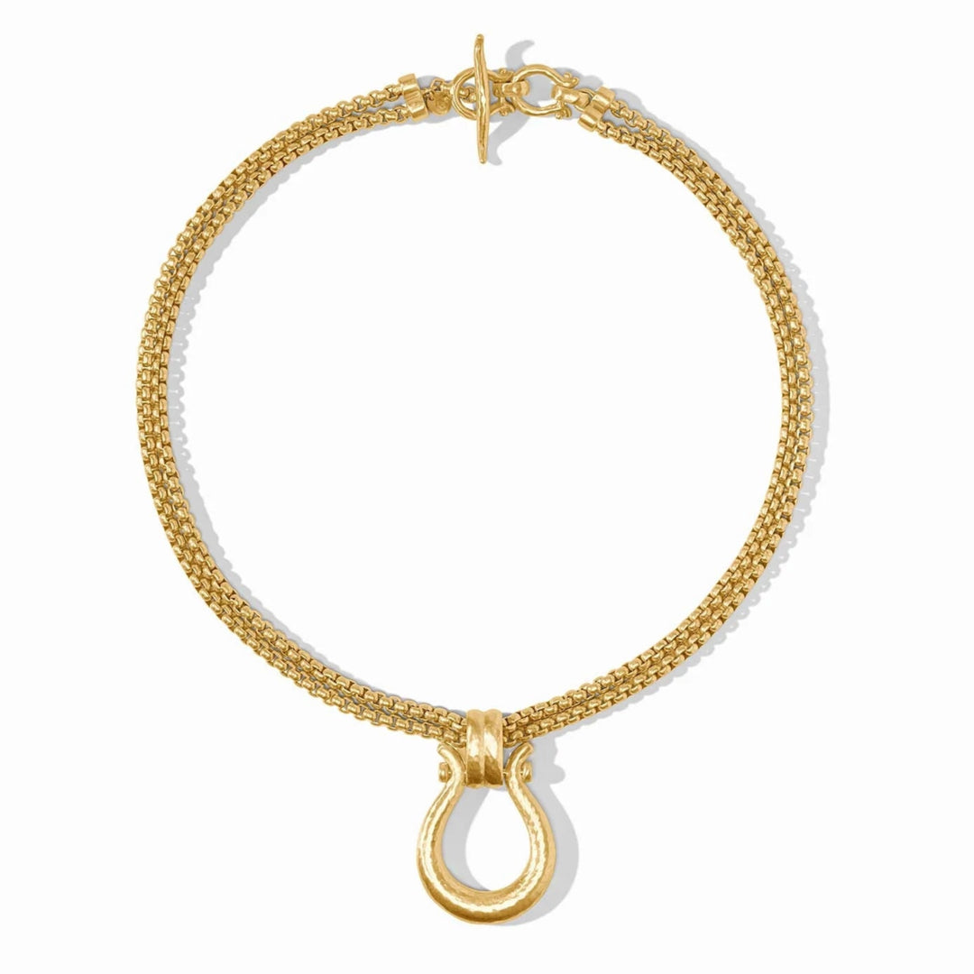 Gold necklace with a clasp on a white background
