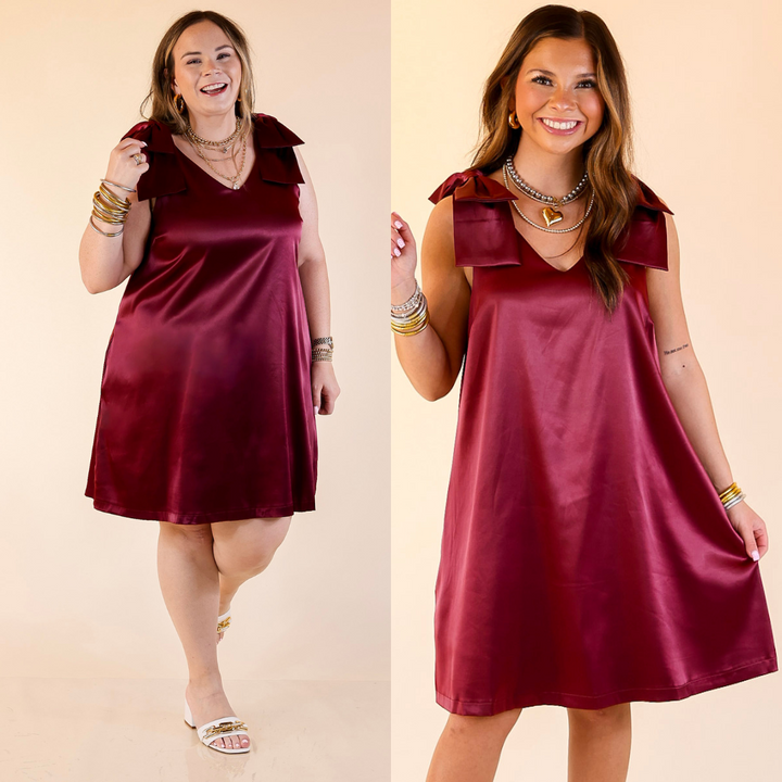Two images of a woman wearing a maroon dress with bow strap detailing against a beige background