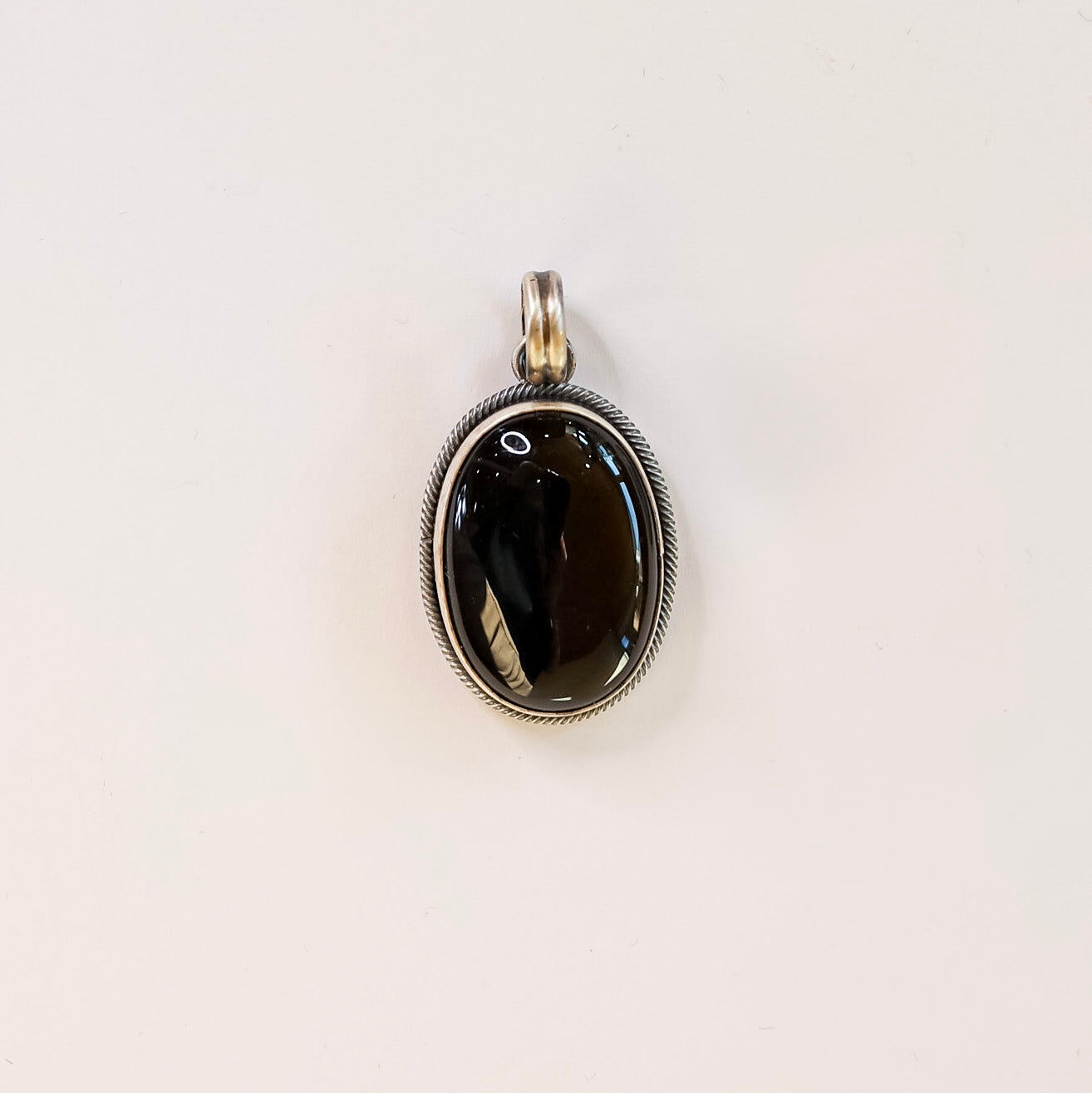 Scott Skeets | Navajo Handmade Sterling Silver Oval Black Onyx Pendant