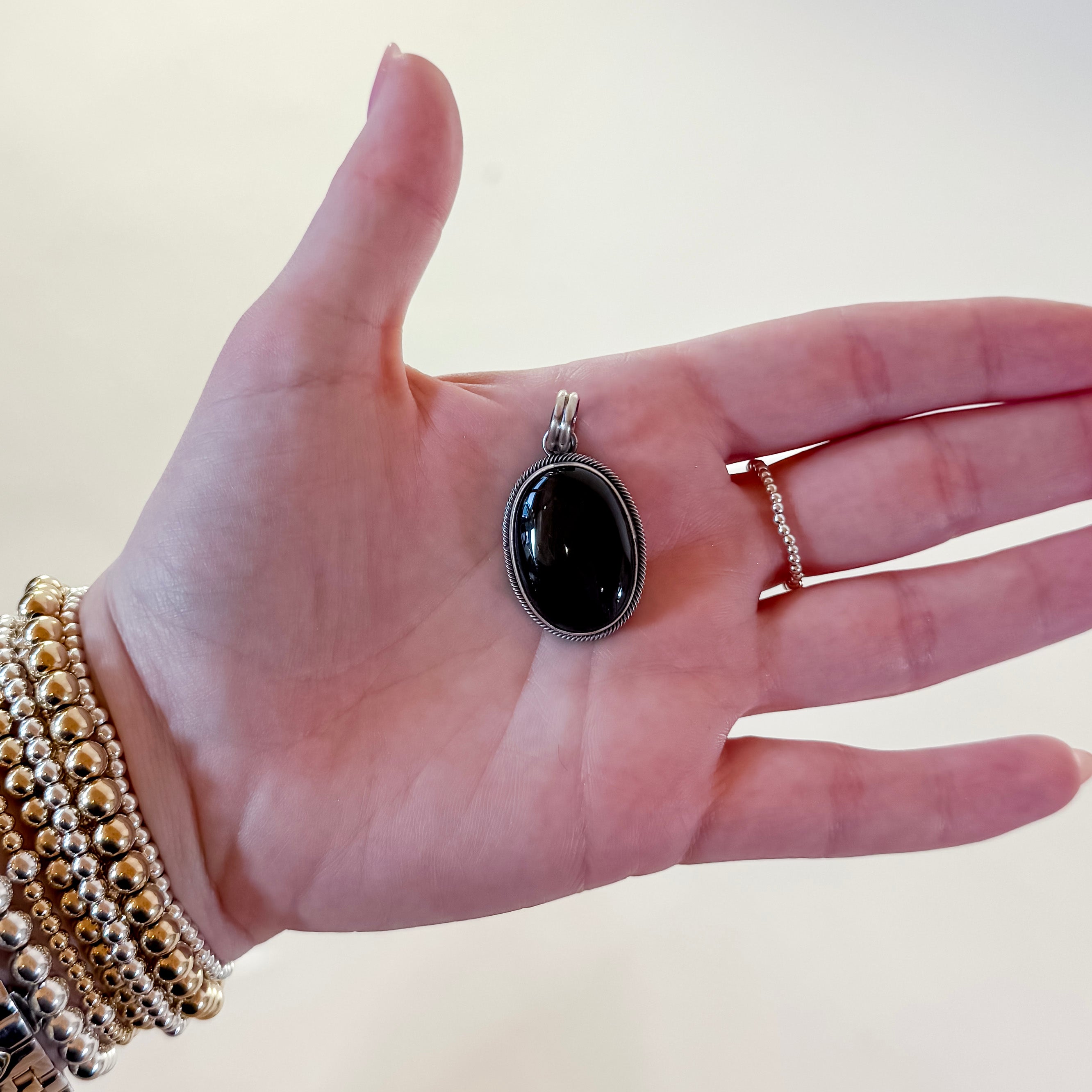 Scott Skeets | Navajo Handmade Sterling Silver Oval Black Onyx Pendant