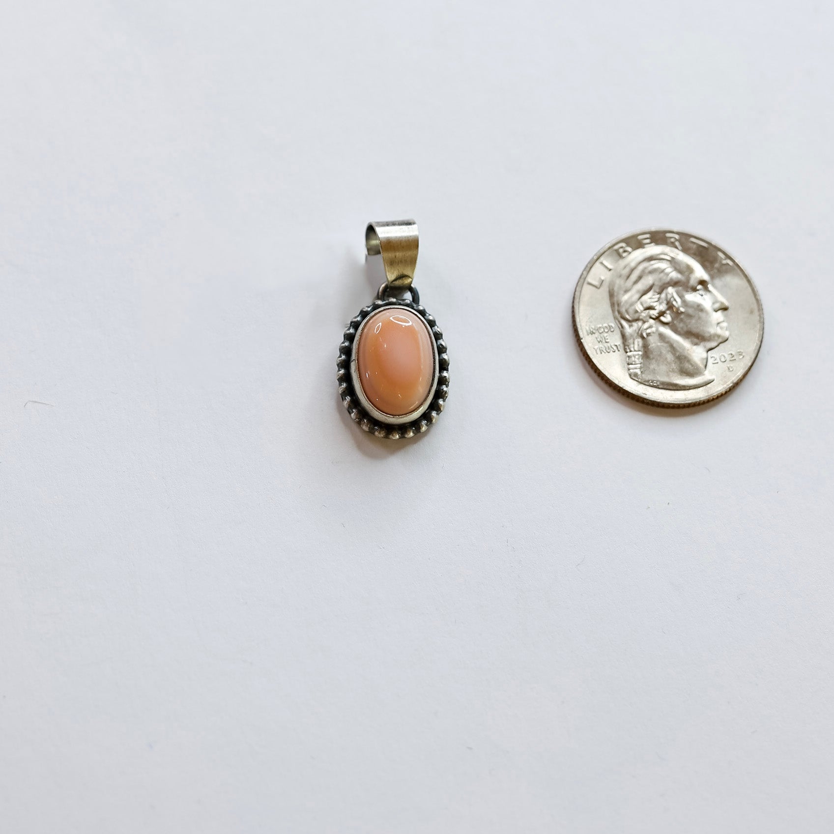 Scott Skeets | Navajo Handmade Sterling Silver Oval Pink Conch Pendant