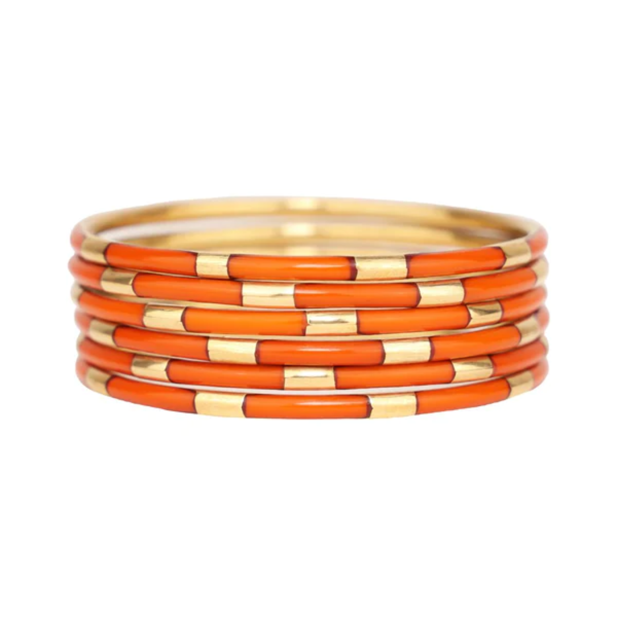 This set of Veda Bangles in Burnt Orange by Budha Girl are pictured on a white background.